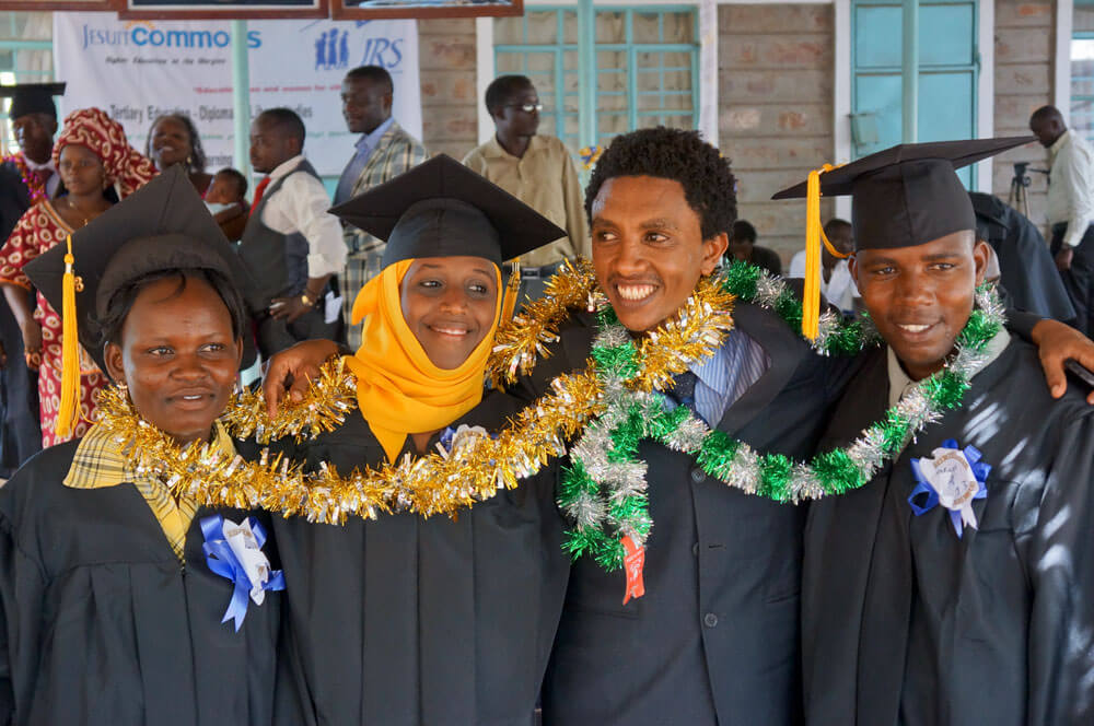 Graduates of the first Jesuit Commons: Higher Education at the Margins cohort receive a Diploma in Liberal Studies from Regis University after three years of studying at the project site in Kakuma refugee camp. [SOURCE: Jesuit Refugee Service] 